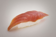 Tuna nigiri in hot teriyaki sauce